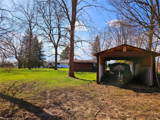 Several outbuildings, including a drive-through boat house | Image 2