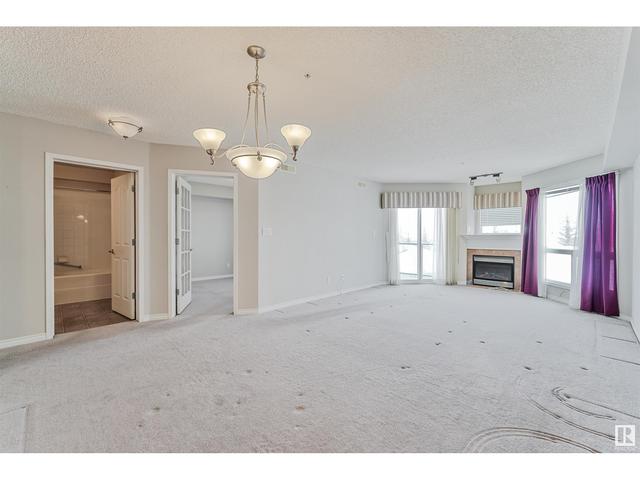 303 - 102a Bridgeport Cx, Condo with 1 bedrooms, 1 bathrooms and null parking in Leduc AB | Image 12