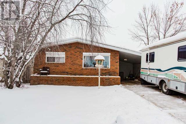 10506 101 Avenue, House detached with 2 bedrooms, 2 bathrooms and 5 parking in Grande Prairie AB | Image 2