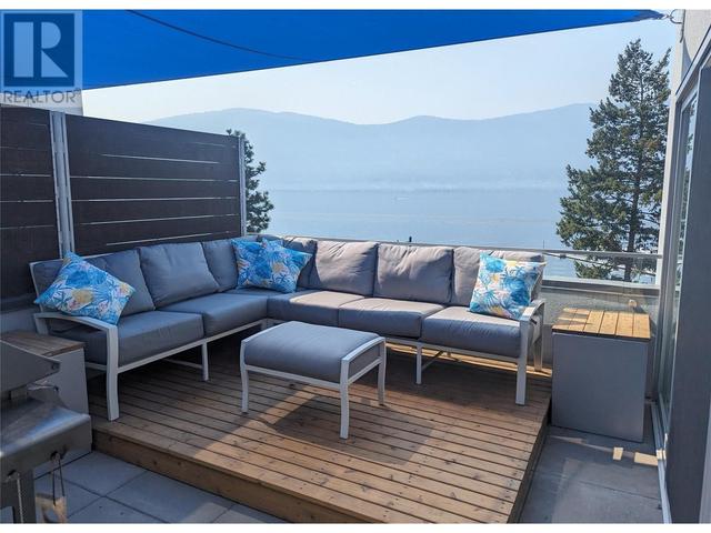 104 - 3398 Mckinley Beach Lane, House attached with 2 bedrooms, 2 bathrooms and 1 parking in Kelowna BC | Image 23
