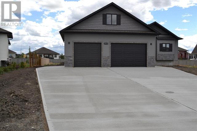15713 107 Street, House detached with 3 bedrooms, 2 bathrooms and 8 parking in Grande Prairie County No. 1 AB | Image 2