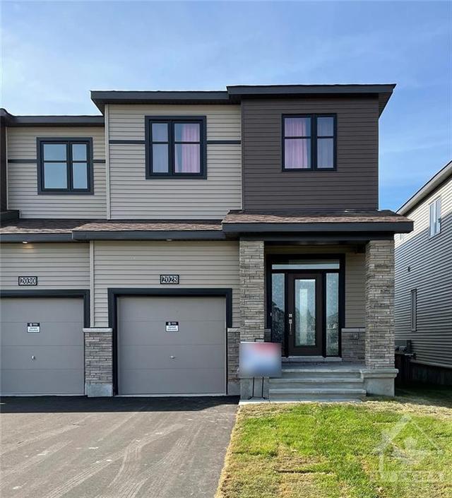 2028 Caltra Crescent, Townhouse with 3 bedrooms, 4 bathrooms and 3 parking in Ottawa ON | Image 1
