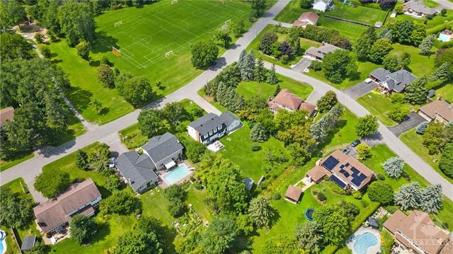5545 Van Vliet is located on a quiet street across from a park. Surrounded by mature trees, this .49 acre property is in the highly desirable neighbourhood of the south island, walking distance fr | Image 30
