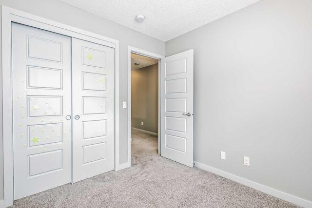 512 - 32 Red Embers Parade Ne, Home with 2 bedrooms, 2 bathrooms and 2 parking in Calgary AB | Image 35
