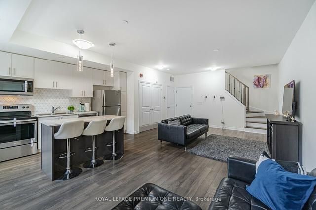 10 - 100 Long Branch Ave, Townhouse with 2 bedrooms, 3 bathrooms and 1 parking in Toronto ON | Image 7
