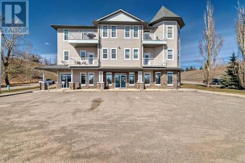 307, - 144 Crescent Road W, Condo with 2 bedrooms, 2 bathrooms and 2 parking in Okotoks AB | Card Image
