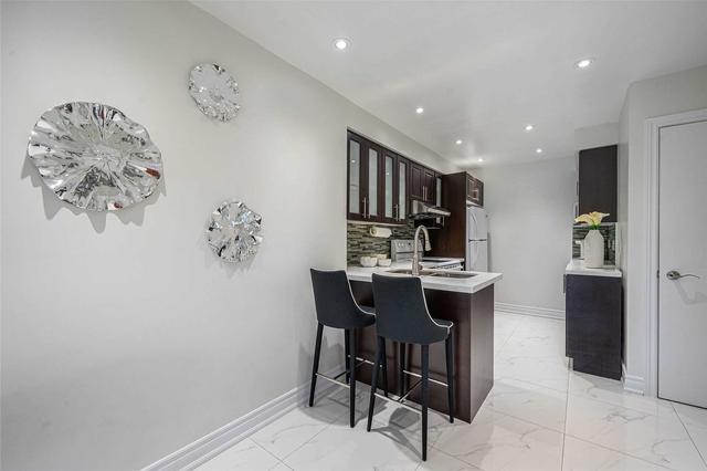 36 O'halloran Cres, House attached with 3 bedrooms, 3 bathrooms and 3 parking in Toronto ON | Image 23