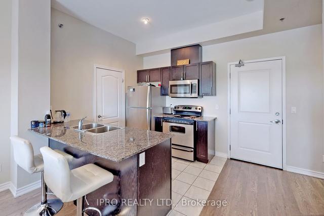 402 - 1370 Costigan Rd, Condo with 2 bedrooms, 2 bathrooms and 1 parking in Milton ON | Image 6