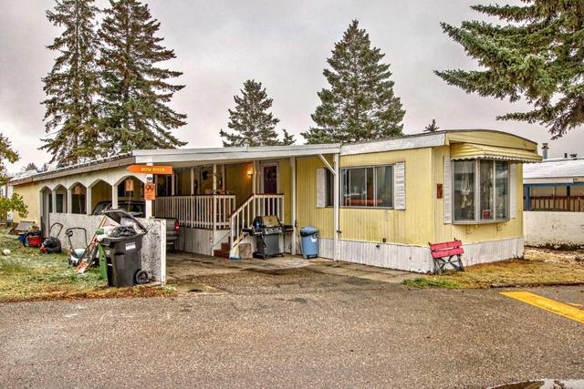99 - 3223 83 Street Nw, Home with 3 bedrooms, 1 bathrooms and 2 parking in Calgary AB | Image 3
