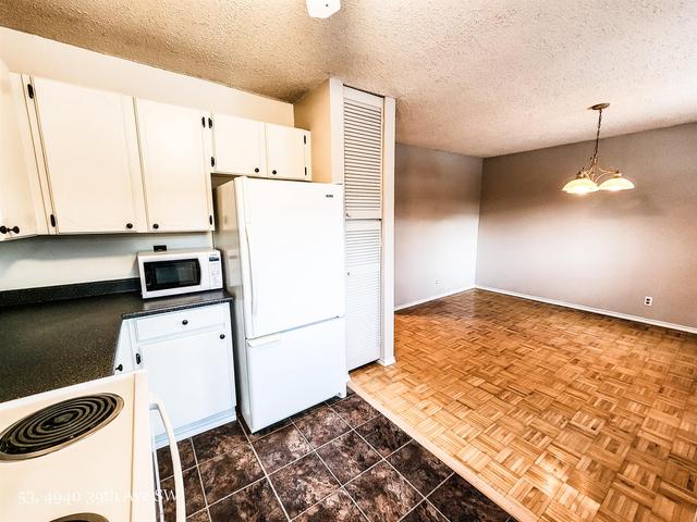 53 - 4940 39 Avenue Sw, Home with 3 bedrooms, 1 bathrooms and 1 parking in Calgary AB | Image 10