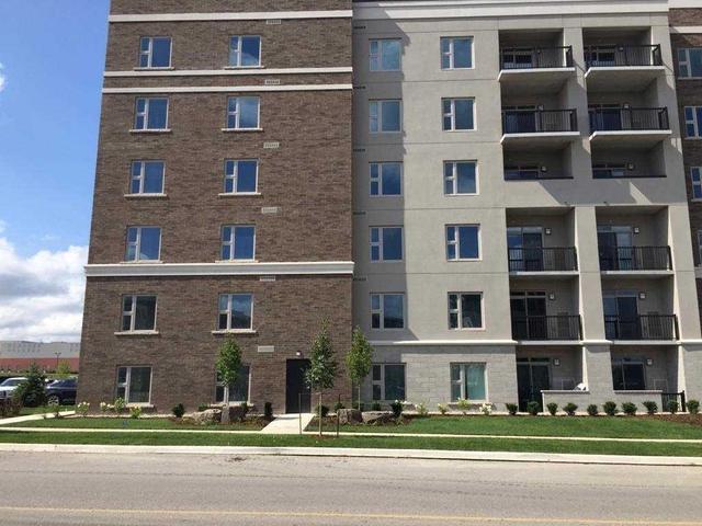 222 - 610 Farmstead Dr, Condo with 2 bedrooms, 1 bathrooms and 1 parking in Milton ON | Image 1