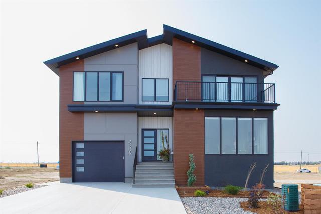 328 Coulee Ridge Drive Sw, House detached with 5 bedrooms, 3 bathrooms and 4 parking in Medicine Hat AB | Image 1