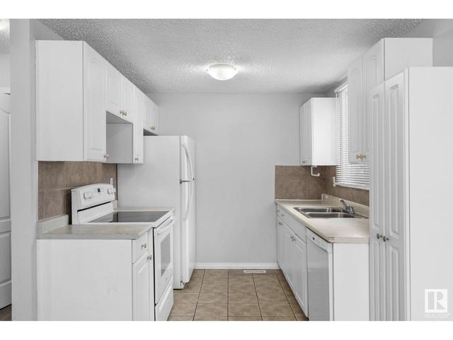 9f Clareview Vg Nw, House attached with 3 bedrooms, 1 bathrooms and 1 parking in Edmonton AB | Image 12