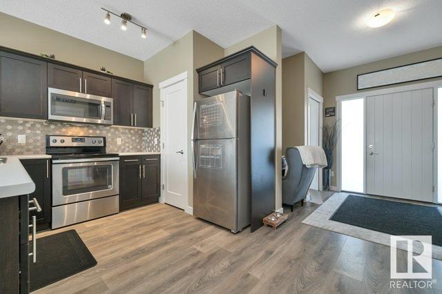693 Black Stone Bv, House attached with 3 bedrooms, 2 bathrooms and null parking in Leduc AB | Image 9