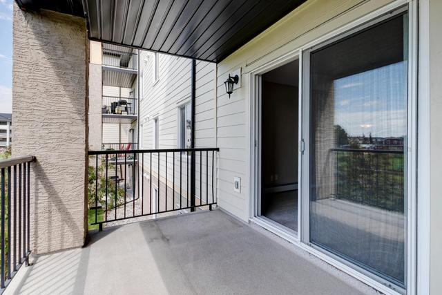 7204 - 304 Mackenzie Way Sw, Condo with 2 bedrooms, 1 bathrooms and 1 parking in Calgary AB | Image 14