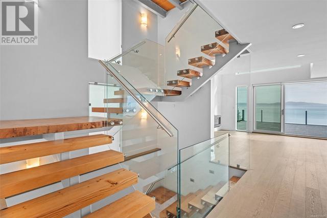 Living level stairs | Up to office | Down to bedrooms/laundry | Image 15