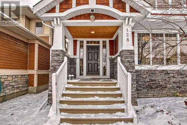 128 Mike Ralph Way Sw, House detached with 4 bedrooms, 3 bathrooms and 2 parking in Calgary AB | Image 2
