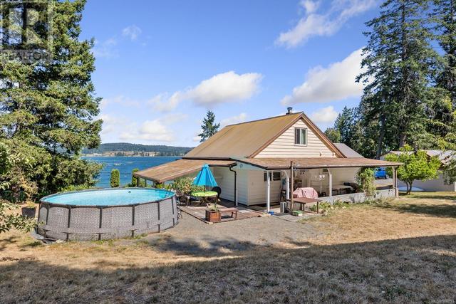 6249 Island Hwy, House detached with 3 bedrooms, 3 bathrooms and 8 parking in Comox Valley A BC | Image 84
