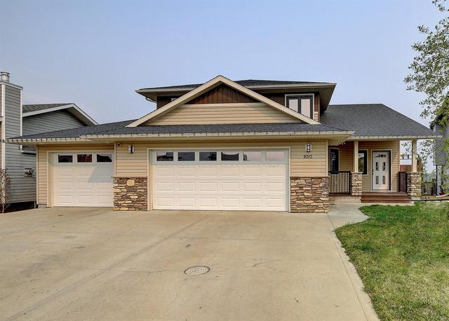 9312 102 Street, House detached with 3 bedrooms, 3 bathrooms and 8 parking in Sexsmith AB | Image 1
