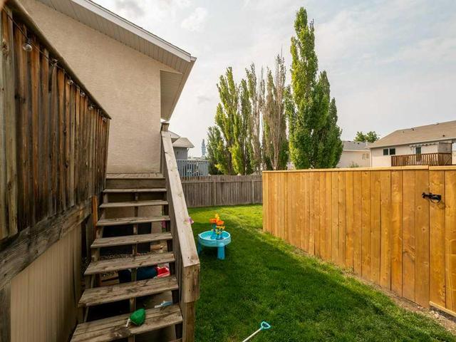 777 Red Crow Boulevard W, House detached with 4 bedrooms, 2 bathrooms and 2 parking in Lethbridge AB | Image 39