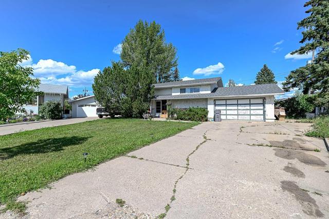 11219 93 Street, House detached with 4 bedrooms, 2 bathrooms and 4 parking in Grande Prairie AB | Image 1