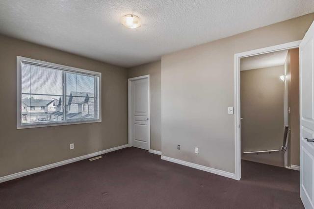 10 Everridge Gardens Sw, Home with 2 bedrooms, 2 bathrooms and 2 parking in Calgary AB | Image 27