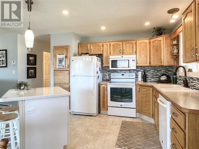 18 - 14008 Victoria Road, House attached with 2 bedrooms, 1 bathrooms and 1 parking in Summerland BC | Image 10