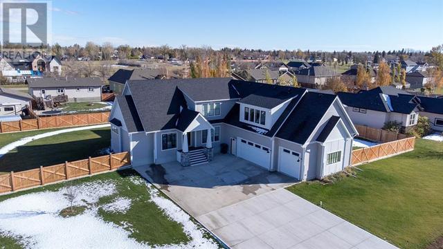 206 6a Street, House detached with 4 bedrooms, 3 bathrooms and 9 parking in Stirling AB | Image 1