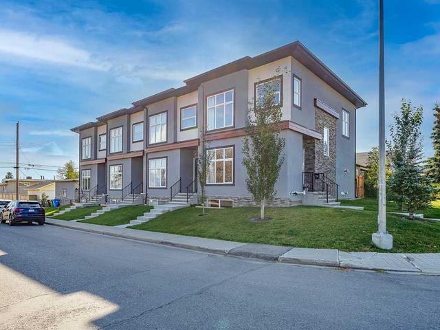 1104 40 Street Sw, Home with 4 bedrooms, 3 bathrooms and 1 parking in Calgary AB | Image 1