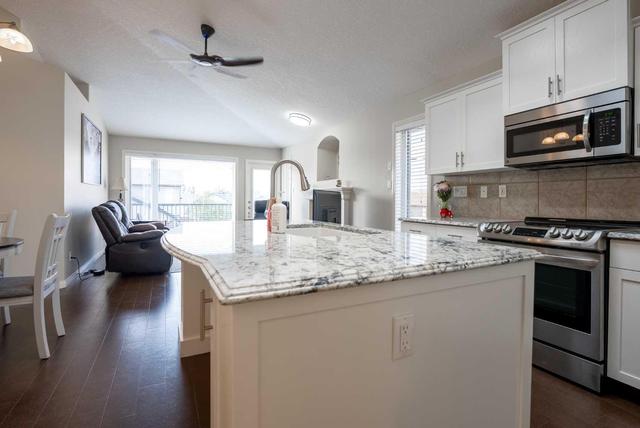 76 Jessie Robinson Close N, House detached with 4 bedrooms, 3 bathrooms and 4 parking in Lethbridge AB | Image 6