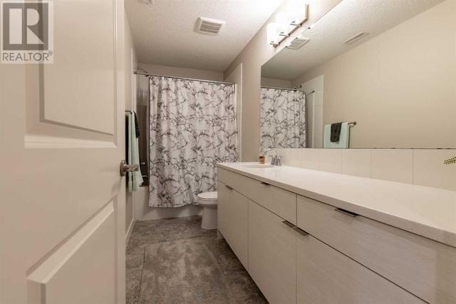 1, - 59 Aquitania Circle W, House attached with 2 bedrooms, 2 bathrooms and 2 parking in Lethbridge AB | Image 24