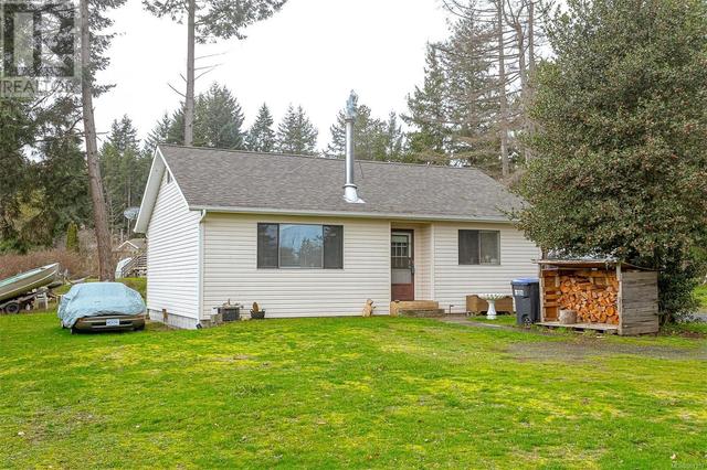5580 Island Hwy W, House detached with 2 bedrooms, 1 bathrooms and 4 parking in Nanaimo H BC | Image 1