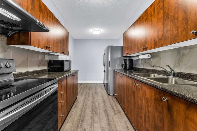 907 - 40 Panorama Crt, Condo with 2 bedrooms, 1 bathrooms and 2 parking in Toronto ON | Image 3