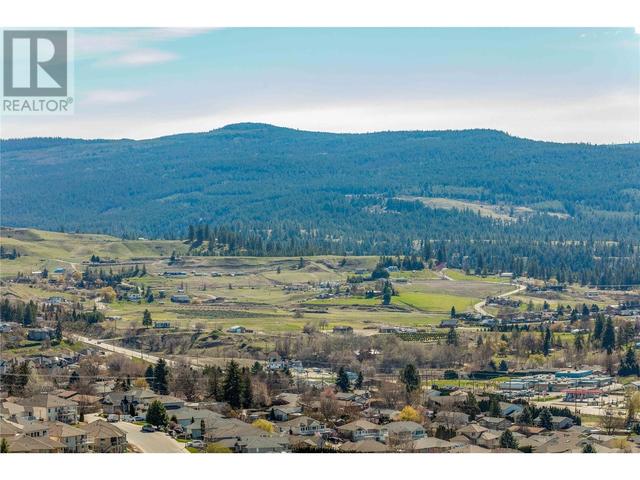 1376 Mine Hill Drive, House detached with 4 bedrooms, 3 bathrooms and 2 parking in Kelowna BC | Image 2