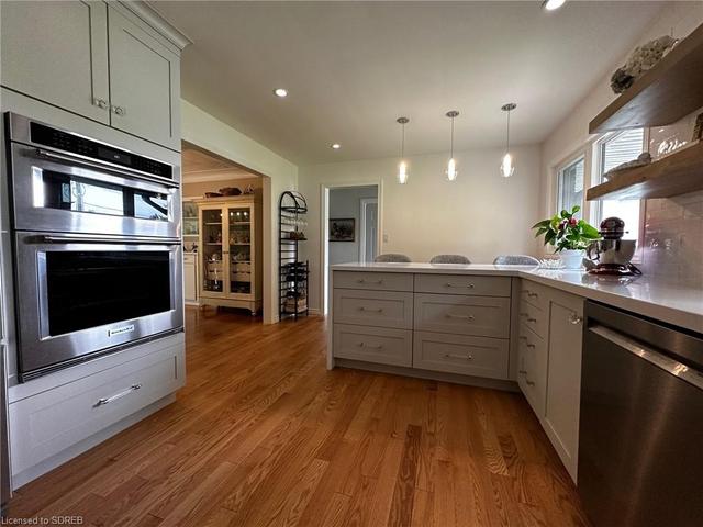 Built in oven and microwave, hardwood floors | Image 7