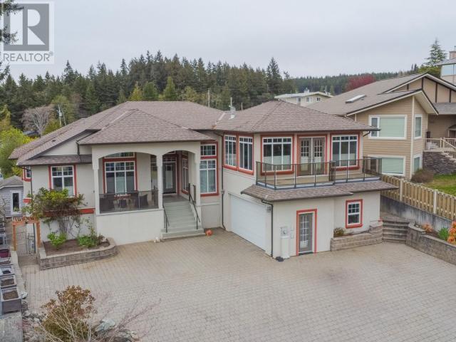 6929 Retaskit Crt, House detached with 5 bedrooms, 4 bathrooms and 2 parking in Powell River BC | Image 84