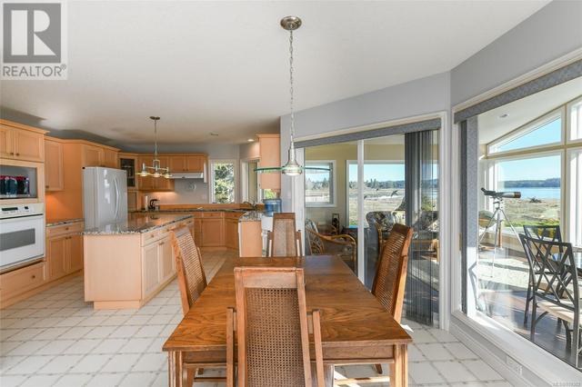 501 Arbutus Bay Rd, House detached with 3 bedrooms, 3 bathrooms and 10 parking in Comox Valley A BC | Image 51