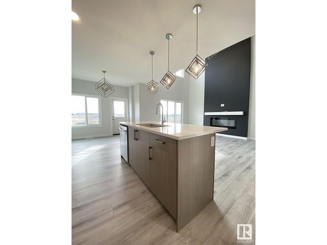 1162 Gyrfalcon Cr Nw, House detached with 7 bedrooms, 4 bathrooms and null parking in Edmonton AB | Image 7