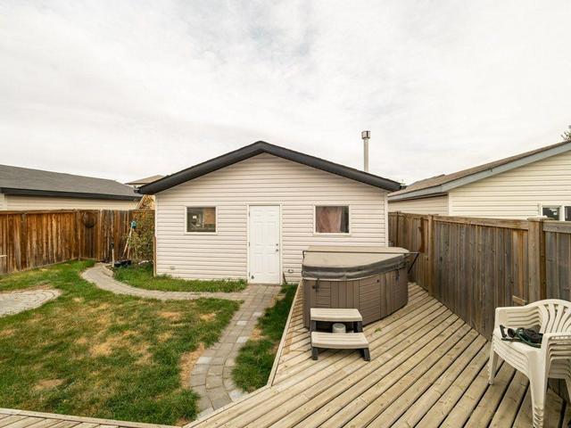 140 Jessie Robinson Close N, House detached with 4 bedrooms, 2 bathrooms and 3 parking in Lethbridge AB | Image 40