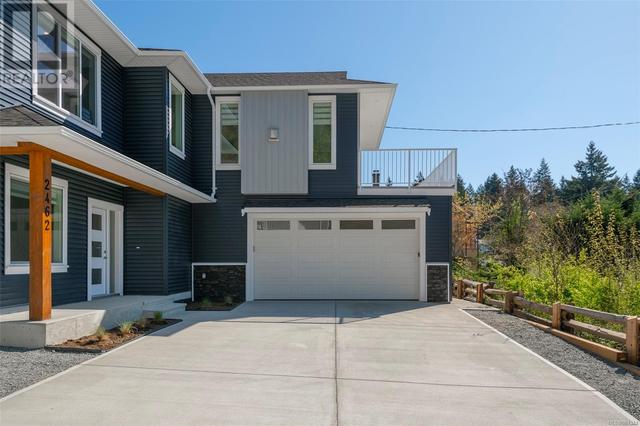 2462 Rosstown Rd, House detached with 6 bedrooms, 4 bathrooms and 4 parking in Nanaimo BC | Image 2
