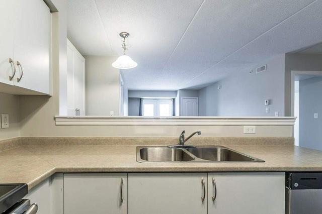 111 - 1470 Main St E, Condo with 2 bedrooms, 2 bathrooms and 1 parking in Milton ON | Image 2