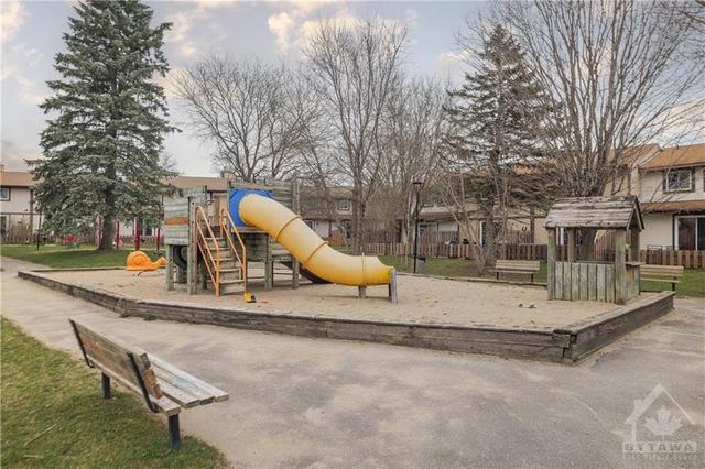 This amazing little park is an extra addition for you're kids to enjoy and can be seen a short distance away from your backyard. You're kids will love it. | Image 29
