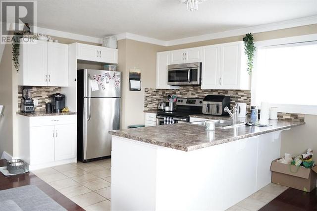 7114 114 Street, House detached with 4 bedrooms, 2 bathrooms and 4 parking in Grande Prairie AB | Image 28