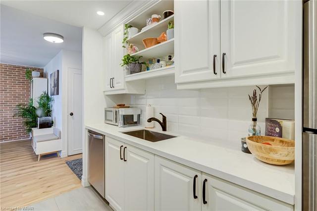 Kitchen with Plenty of Cabinets & Counter Space | Image 10