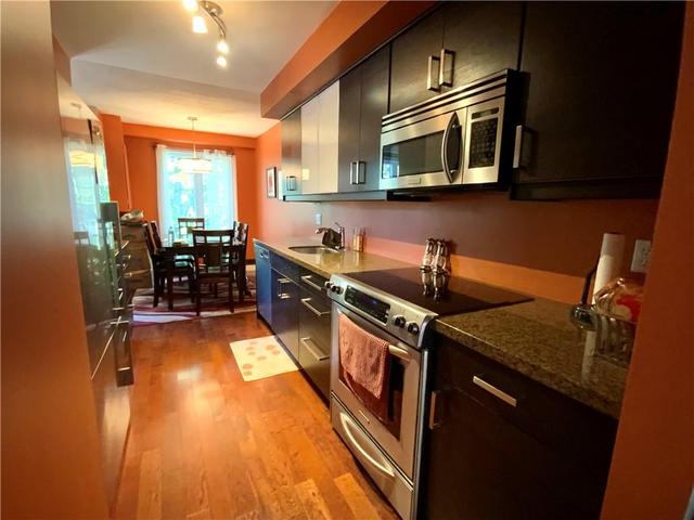 247 - 2075 Walker's Line, House attached with 2 bedrooms, 1 bathrooms and 1 parking in Burlington ON | Image 2