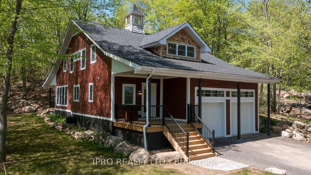 39 Todholm Dr, House detached with 4 bedrooms, 3 bathrooms and 6 parking in Muskoka Lakes ON | Image 1