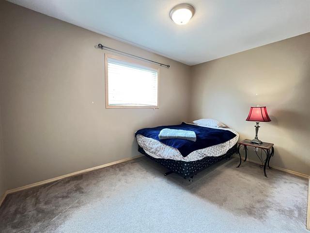 325 Red Crow Boulevard W, House detached with 4 bedrooms, 2 bathrooms and 5 parking in Lethbridge AB | Image 14