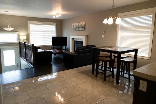 11322 105 Avenue, Home with 4 bedrooms, 4 bathrooms and 4 parking in Grande Prairie AB | Image 4