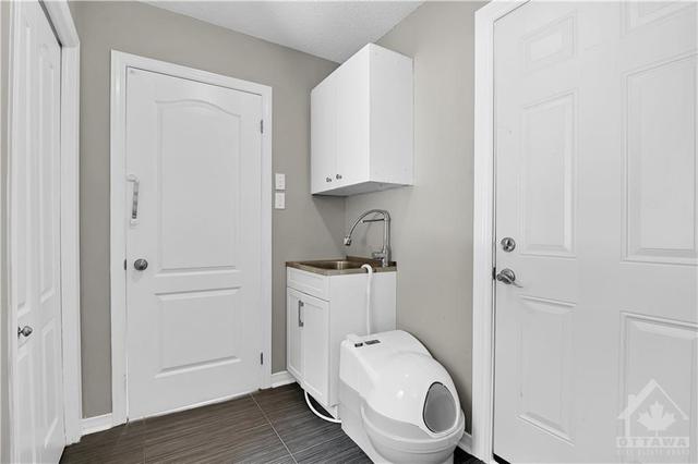 Laundry Room with Entrance to Garage | Image 12