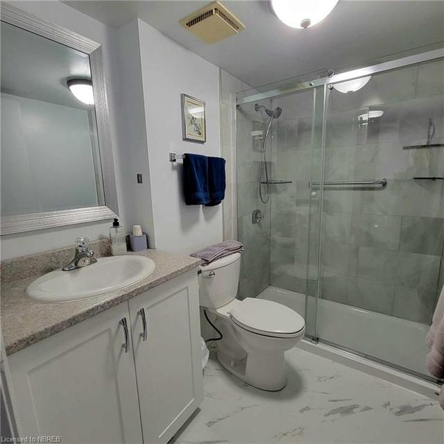 Beautifully updated guest suite bathroom | Image 22